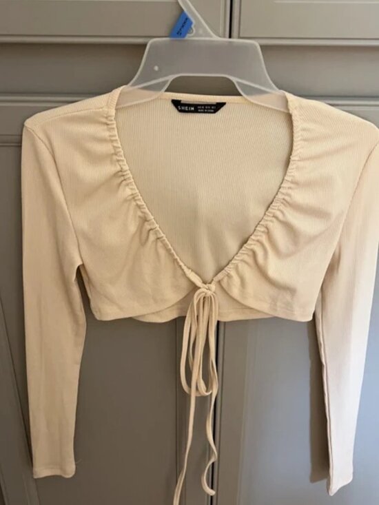 SHEIN Tops - Women’s size xsmall cream colored cropped long sleeve top that ties